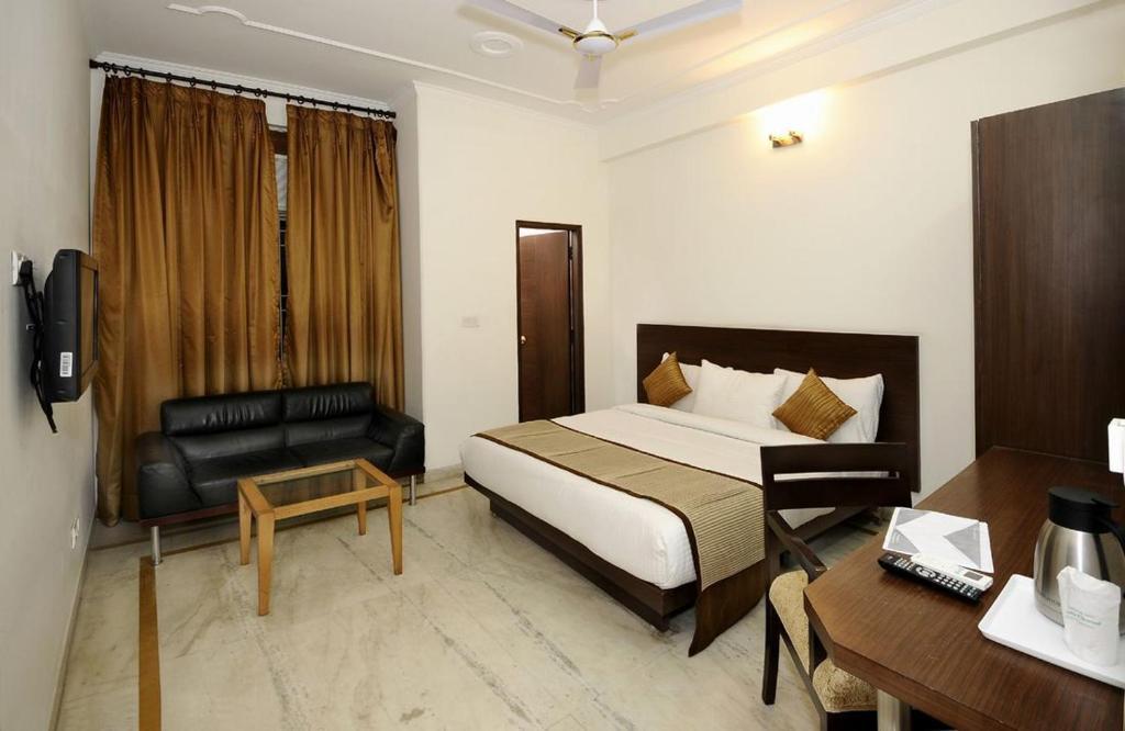 Airport Hotel Goodluck Yeni Delhi Oda fotoğraf