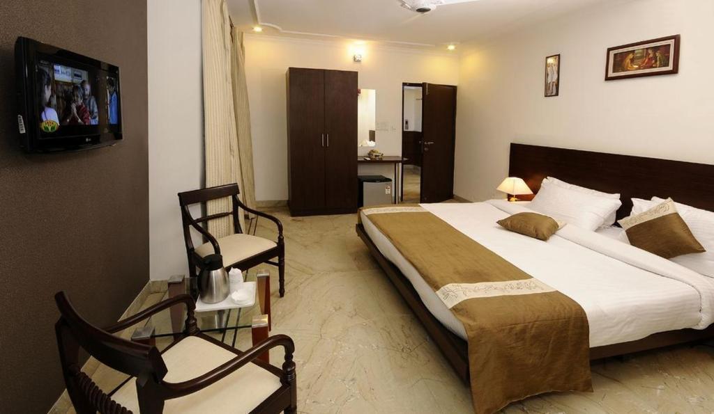 Airport Hotel Goodluck Yeni Delhi Oda fotoğraf